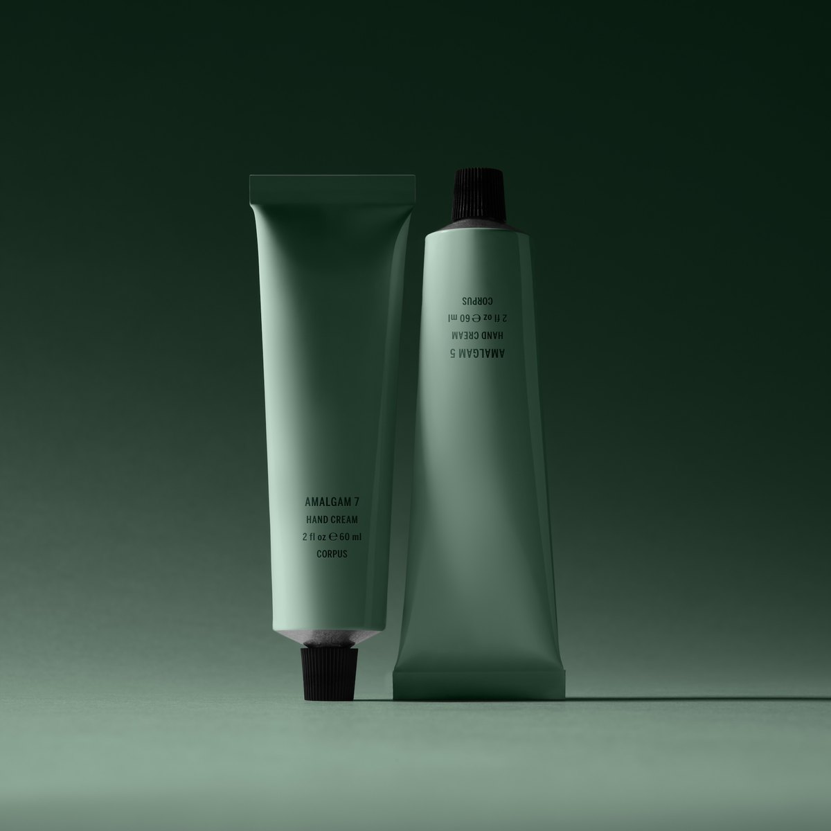 Two green product tubes on a green set